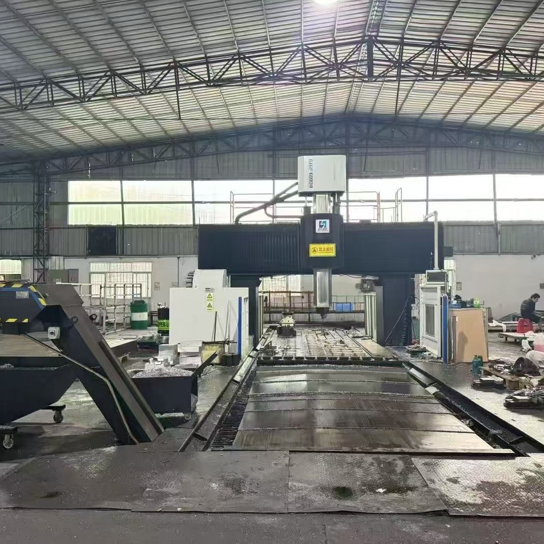 Transfer of Second-Hand Guosheng Gmf6030 Gantry Machining Center Spindle Speed 5000 in Stock