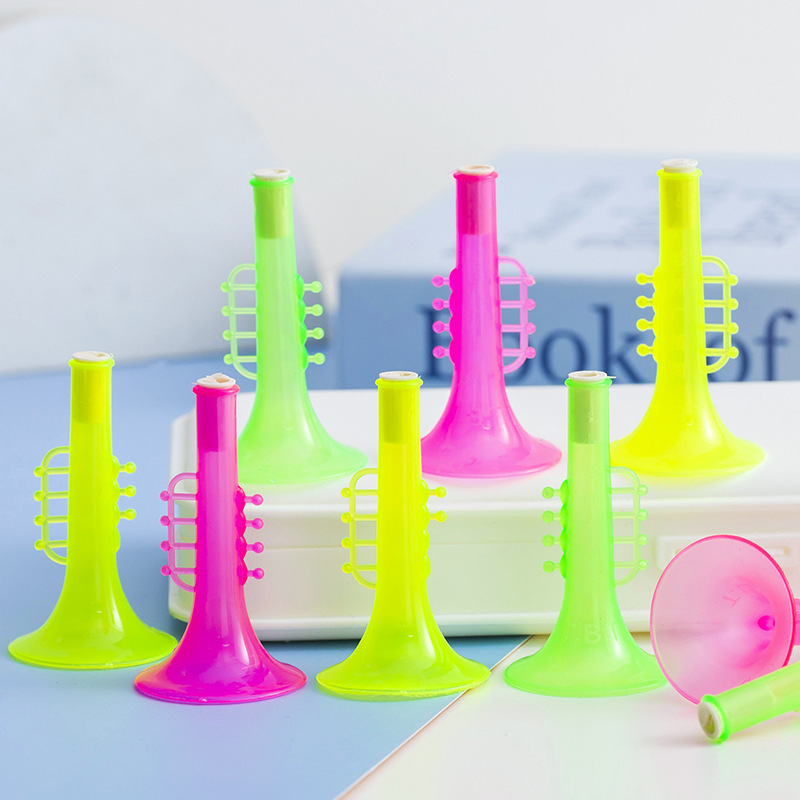 Factory cross-border children's plastic transparent mini trumpet musical instrument twist egg strange egg stall gift toys wholesale