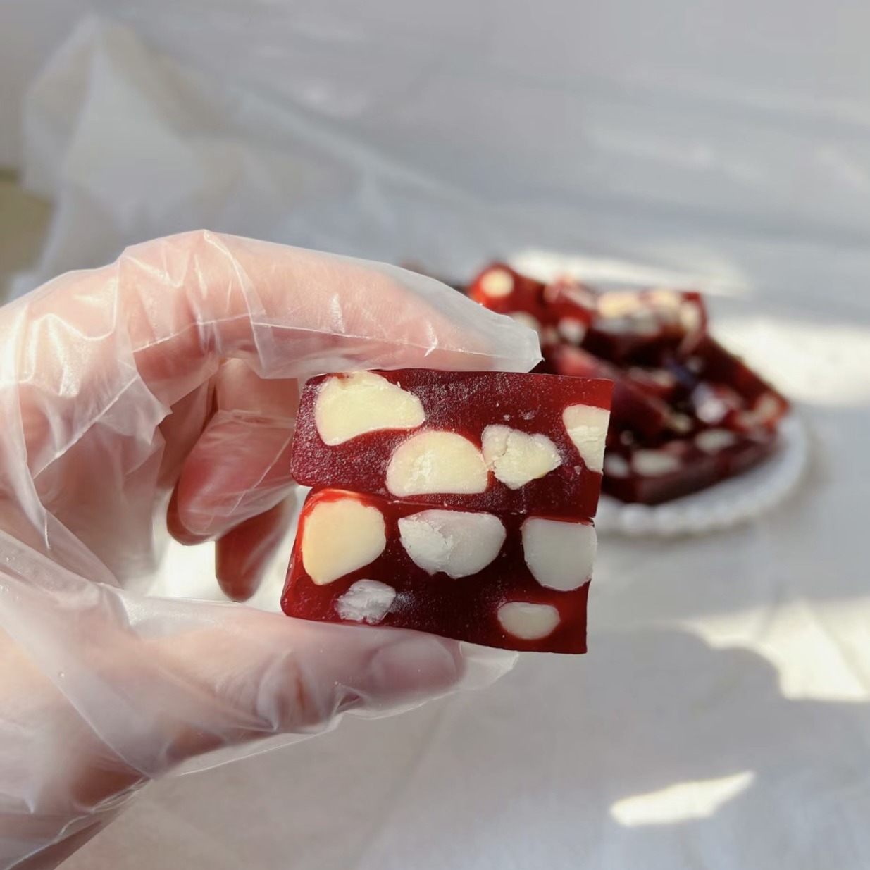 Black sesame raw milk soft cake raspberry toffee macadamia fruit passion fruit wedding candy wedding attraction factory direct sales