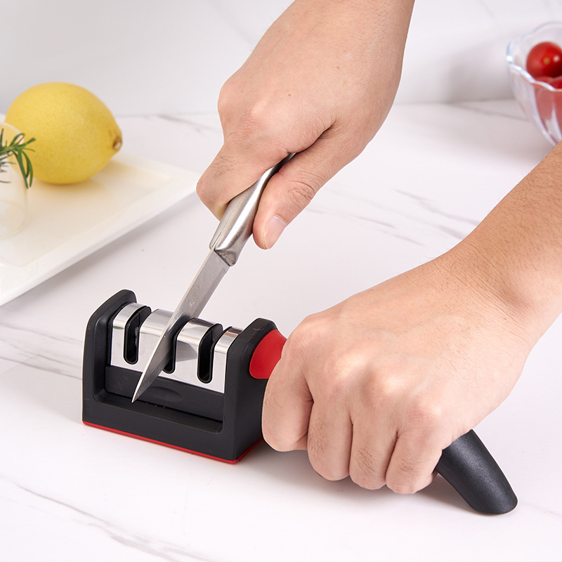 Knife sharpener household hand-held fast sharpening stone kitchen new grinding tool multi-functional three or four segment sharpening artifact