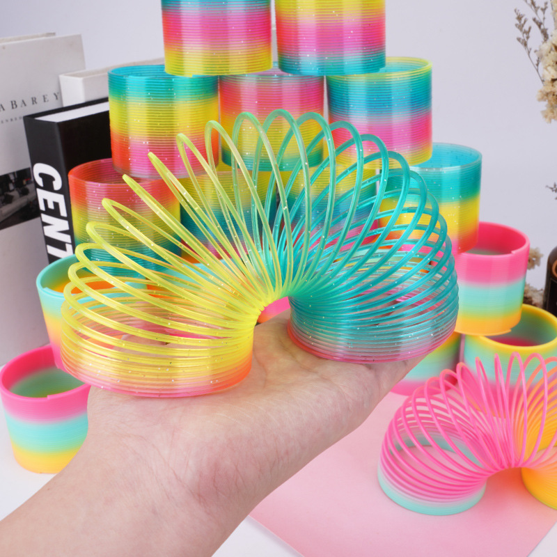 Stall prizes around the school hot selling small toy spring circle puzzle small Bag Magic Rainbow Circle wholesale