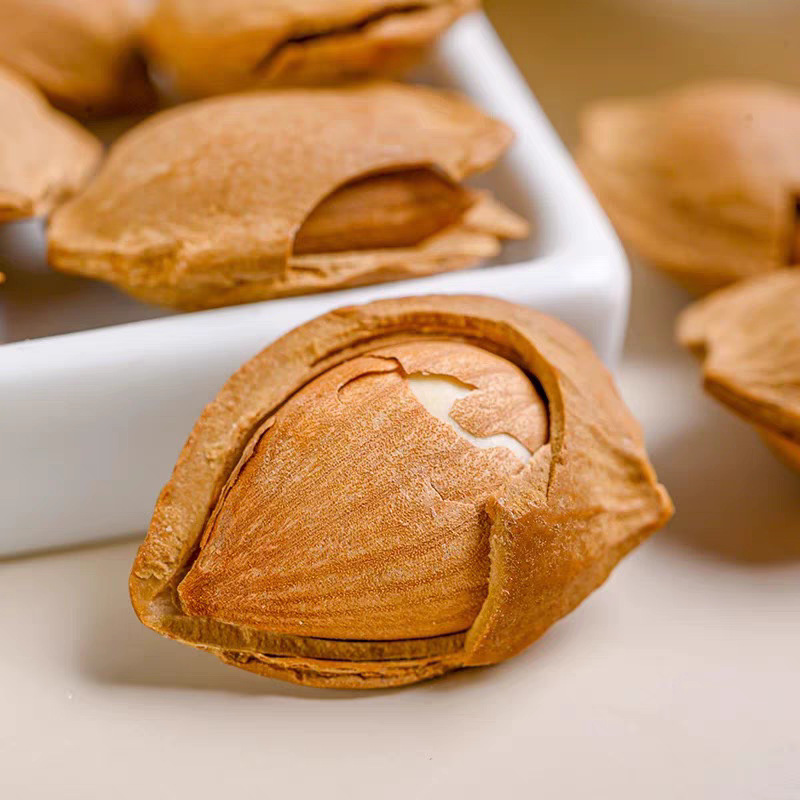 New Arrival Almond Wholesale Hand-Peeled Apricot Hard-Shell Small White Apricot Nuts Ginkgo Large Almond Open Roasted Apricot Kernel Snacks
