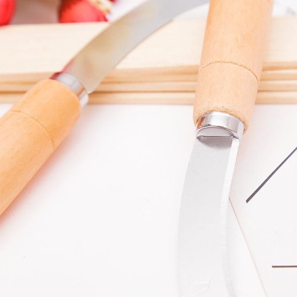 White wooden handle machete pineapple knife