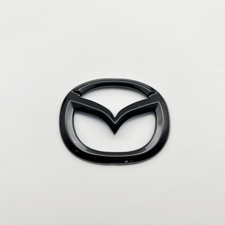 Suitable for Mazda CX-4 car logo Atz cx5 onksela carbon fiber pattern steering wheel labeling cover decoration