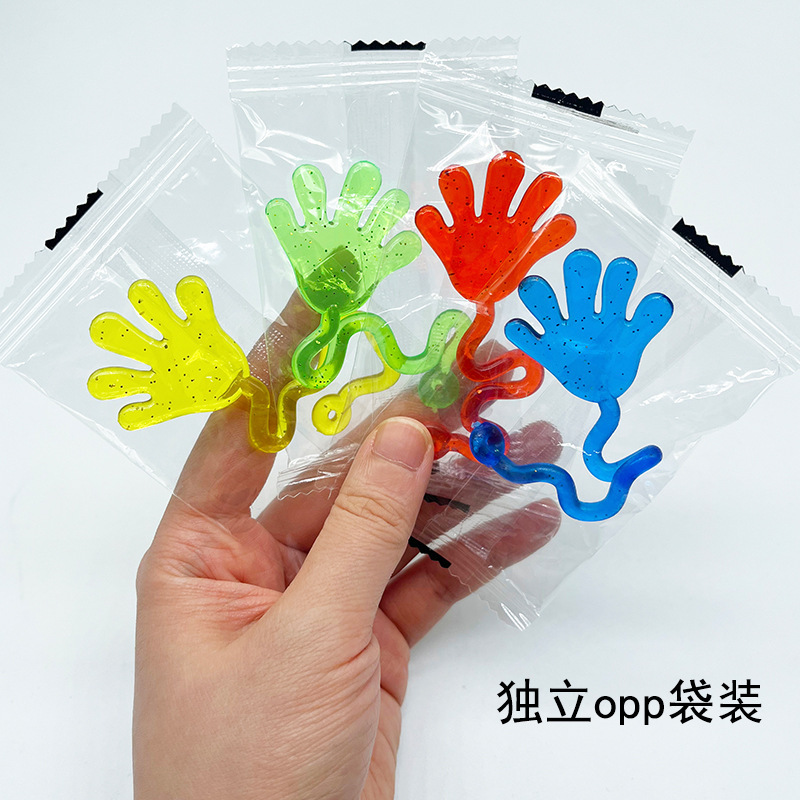 Popular Tpr Soft Rubber Elastic Stretchy Sticky Palm Glitter Gold Powder Wall Climbing Creative Prank Sticky Hands