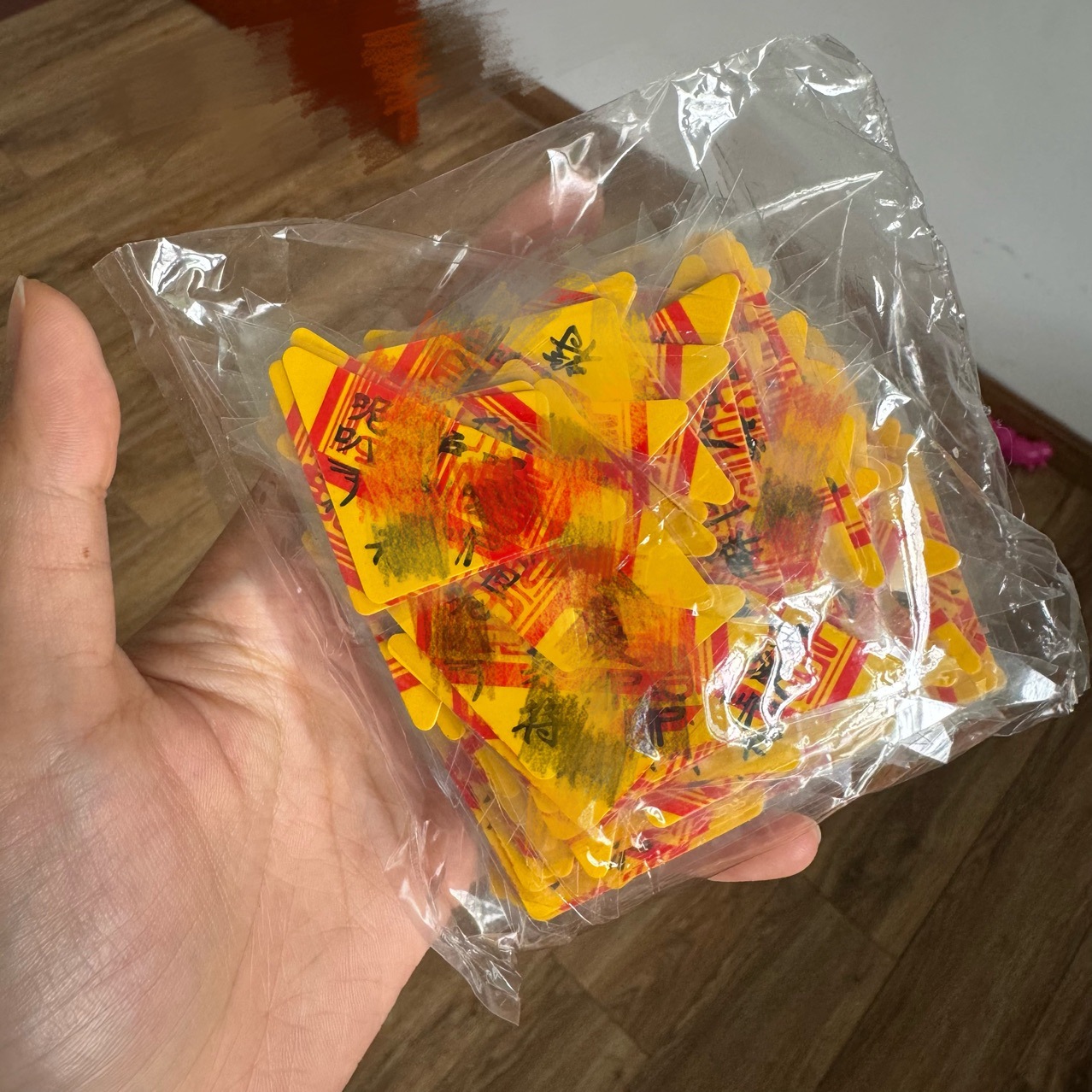 Factory Direct Sales of Various Waterproof Plastic-Sealed Peace and Auspicious Triangle Charms That Can Be Carried with You to Receive Lucky Bags