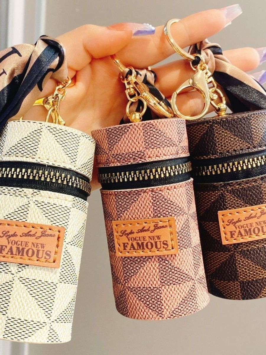 European and American presbyter coin purse 2023 new compact bag pendant earphone bag mouth red envelope mini keychain bag