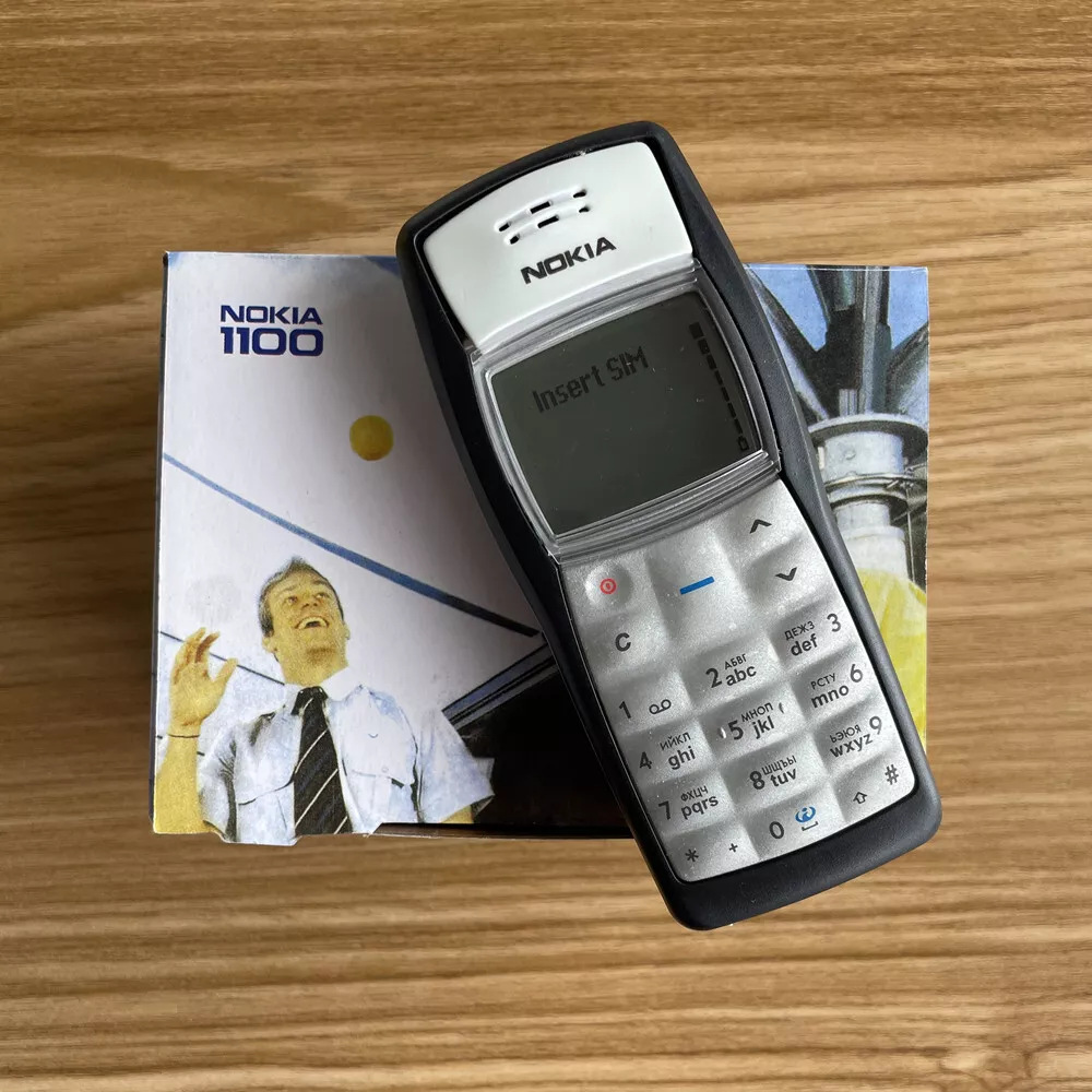 Foreign Trade 1100 Straight Button Yellow Screen Classic Nostalgic Mobile Phone for the Elderly Durable Sentimental Backup Phone