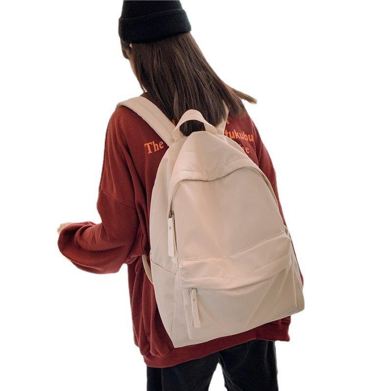 ins Korean style solid color simple fashion backpack men's 2022 new men's and women's casual middle school student backpack fashion