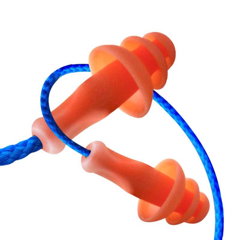 Earplugs can reduce noise and sound insulation. Washable silicone sound insulation earplugs for factory workshops. Christmas tree with cable sleep earplugs