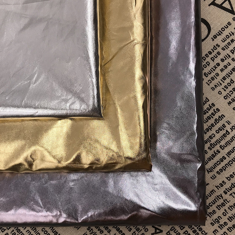 Processing 50D gilding fabric waterproof 300t spring spinning gilding plain metal fabric down jacket fabric
