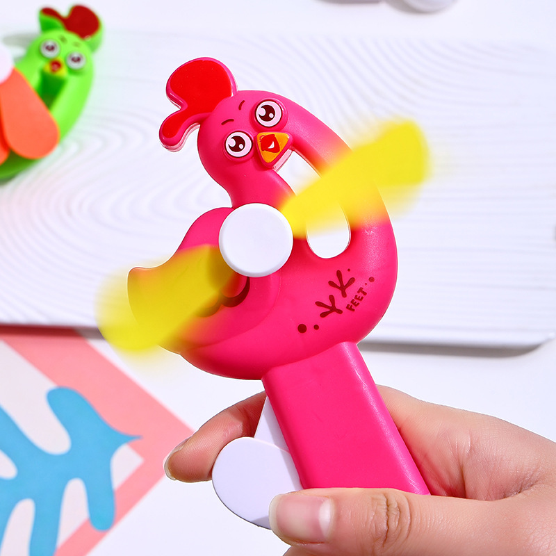 Cute hand pressure small fan toy restaurant gift animal chick hand crank manual fan yiwu toy wholesale