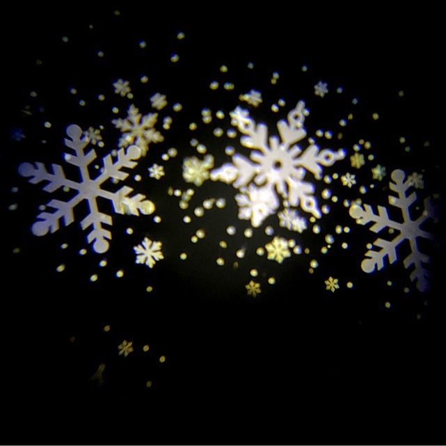 New Bright snowflake projection lamp outdoor Christmas blizzard LED snowflake lamp lawn garden stage lamp cross-border
