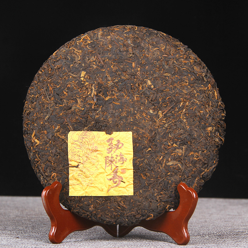 Pu'er tea cooked tea new packaging Menghai Chenxiang 357g Yunnan seven-seed cake tea aged Pu'er golden Bud Tea Cake