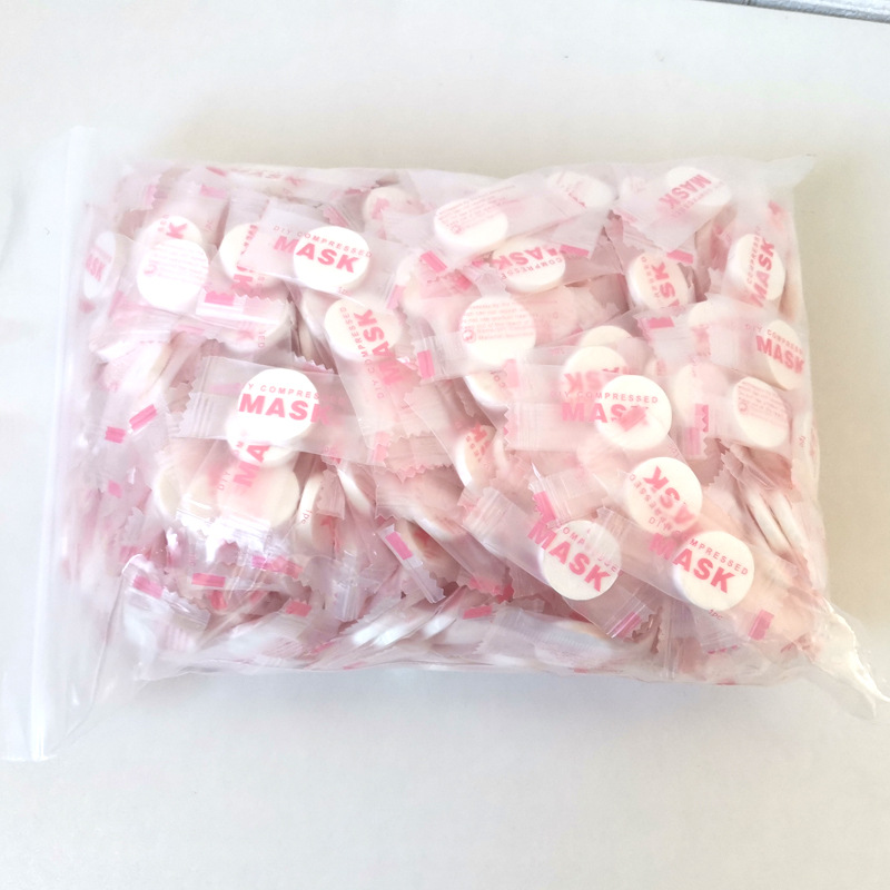 Net red explosions ultra-thin silk compression mask invisible silk mask moisturizing disposable mask a generation of hair