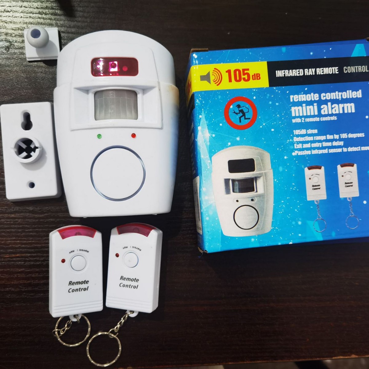 Infrared human body induction remote control alarm electronic dog alarm household door and window alarm voice reminder