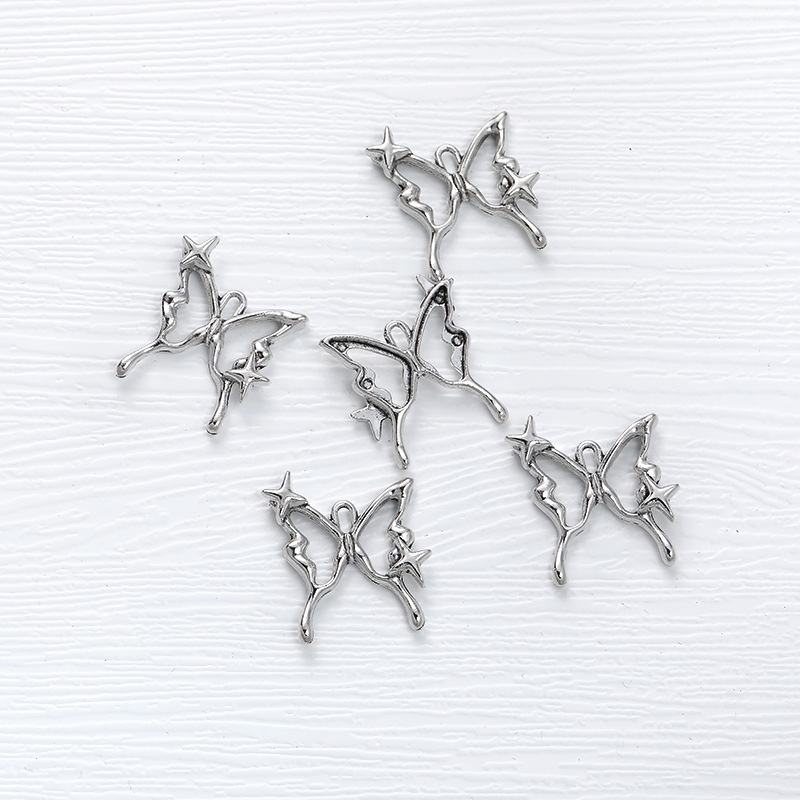 Wholesale starry star five-pointed star four mans star pendant DIY vintage zinc alloy jewelry accessories zakka