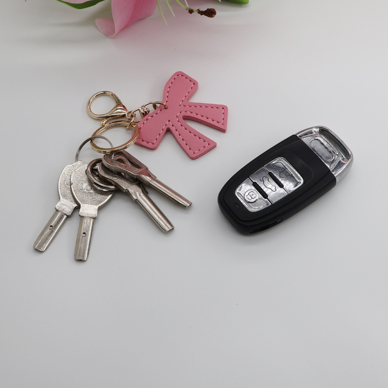 Ins Exquisite Simple Sweet Leather Bow Jewelry Accessories Bag Keychain Car Pendant Mobile Phone Case Hanging