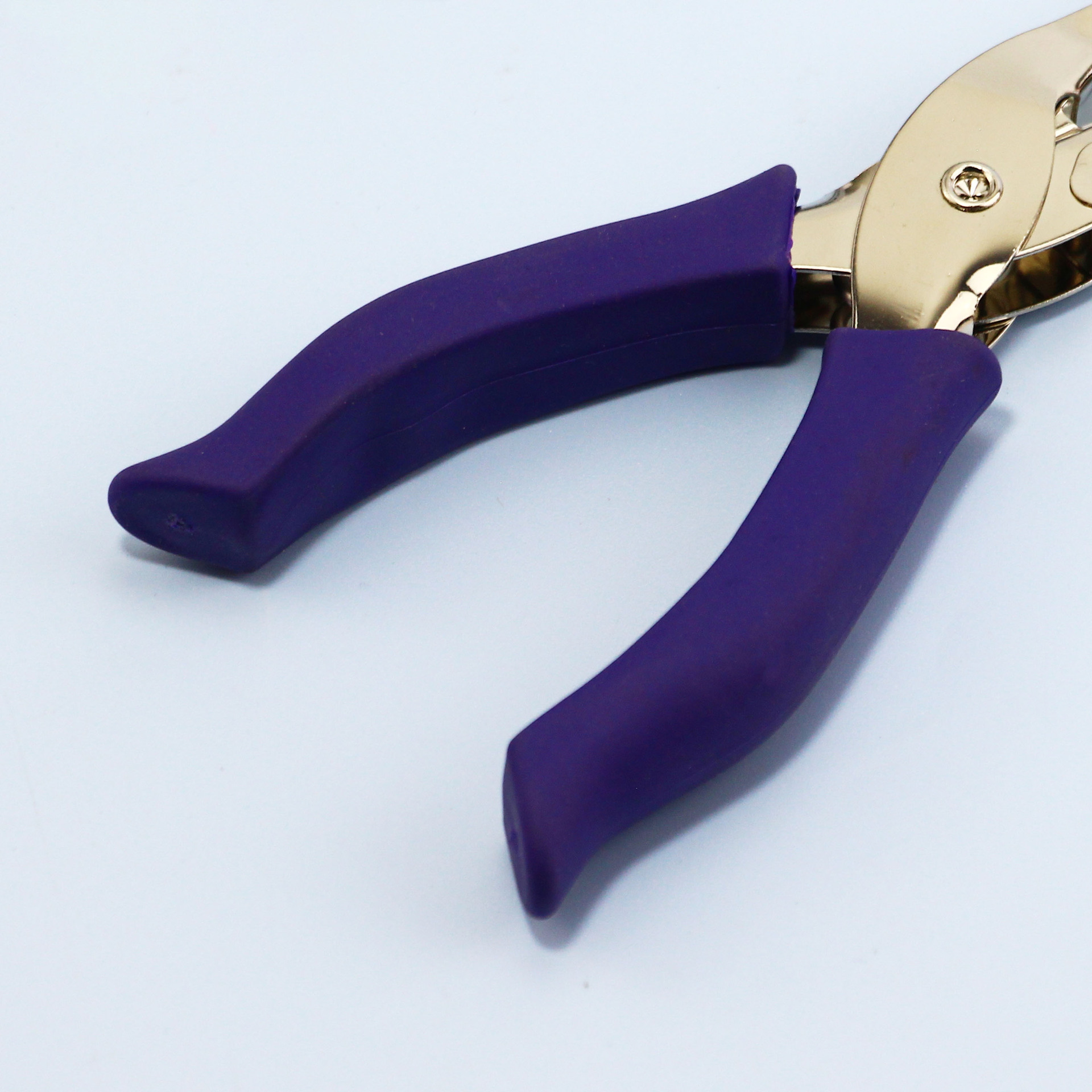 Rubber-coated hand-held puncher stationery binding puncher round hole paper puncher manual punching machine punching pliers