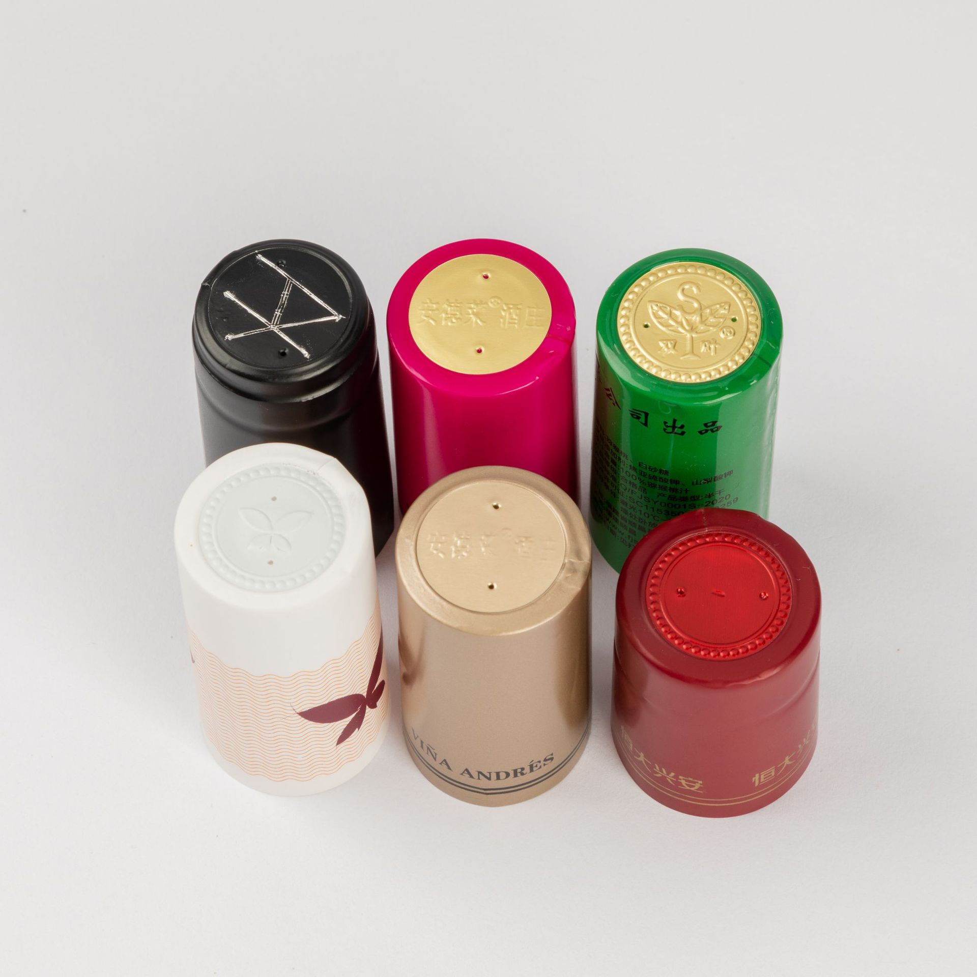 Red wine cap PVC Heat Shrinkable cap pvc beverage rubber cap sealing wine cap factory printing logo glass bottle cap