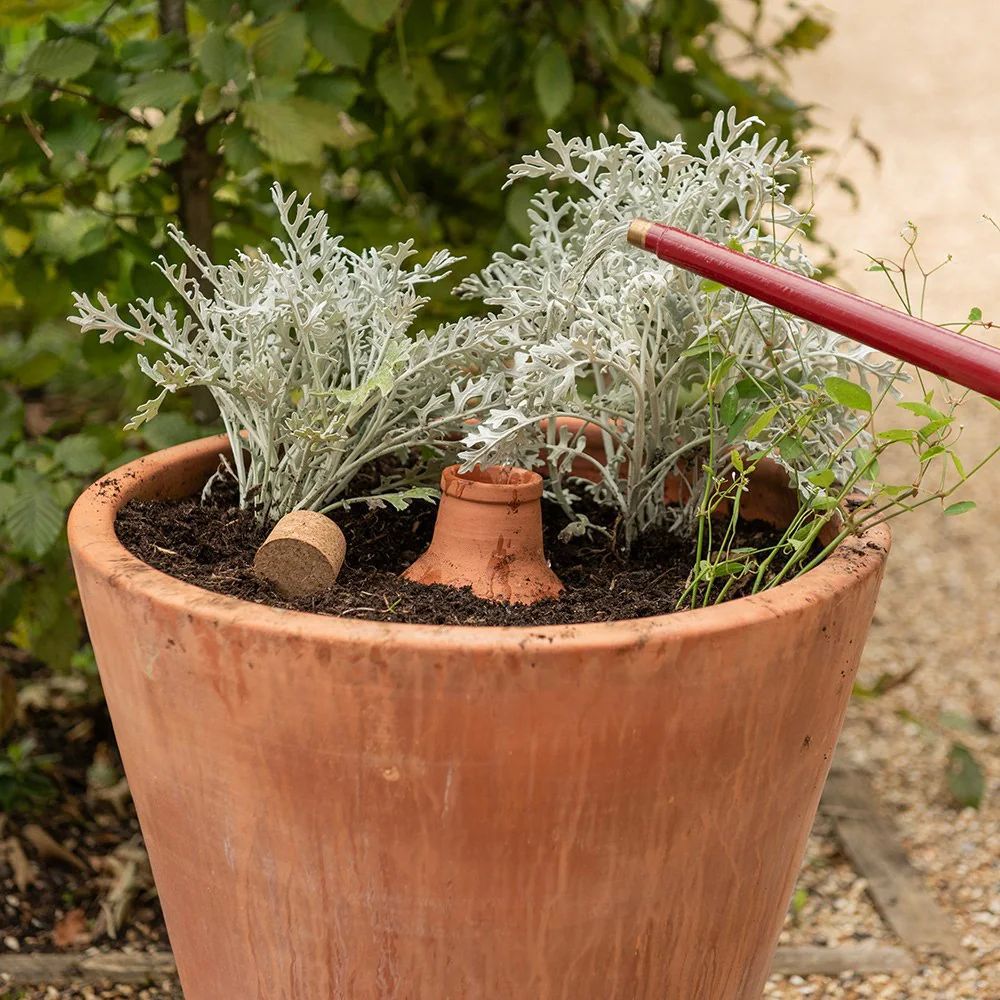 Cross-border automatic watering device red pottery water seepage device flower watering device water bottle with cork lid irrigation system dedicated