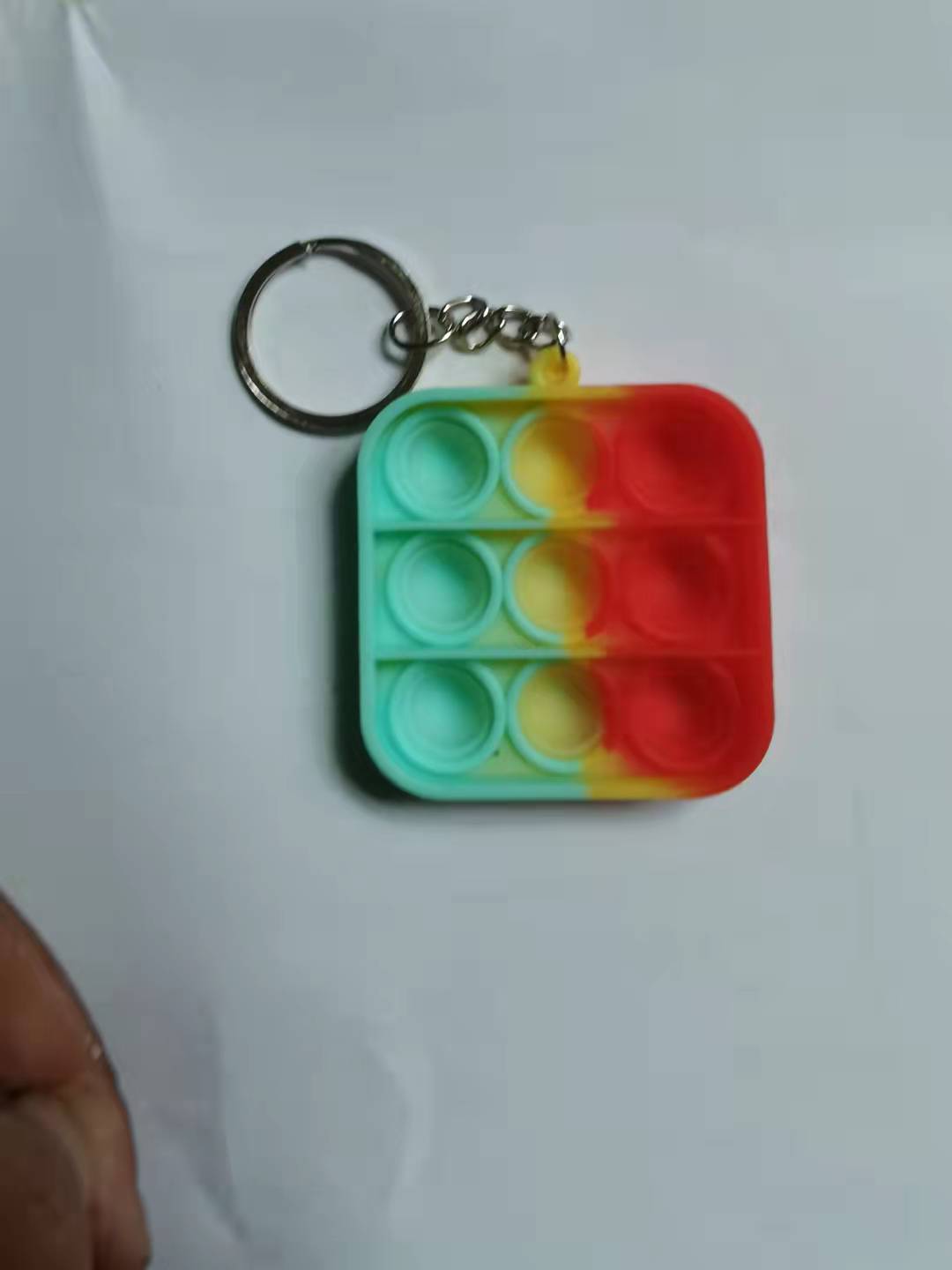 Cross-border color mini silicone keychain pendant decompression toy rodent pioneer finger bubble music