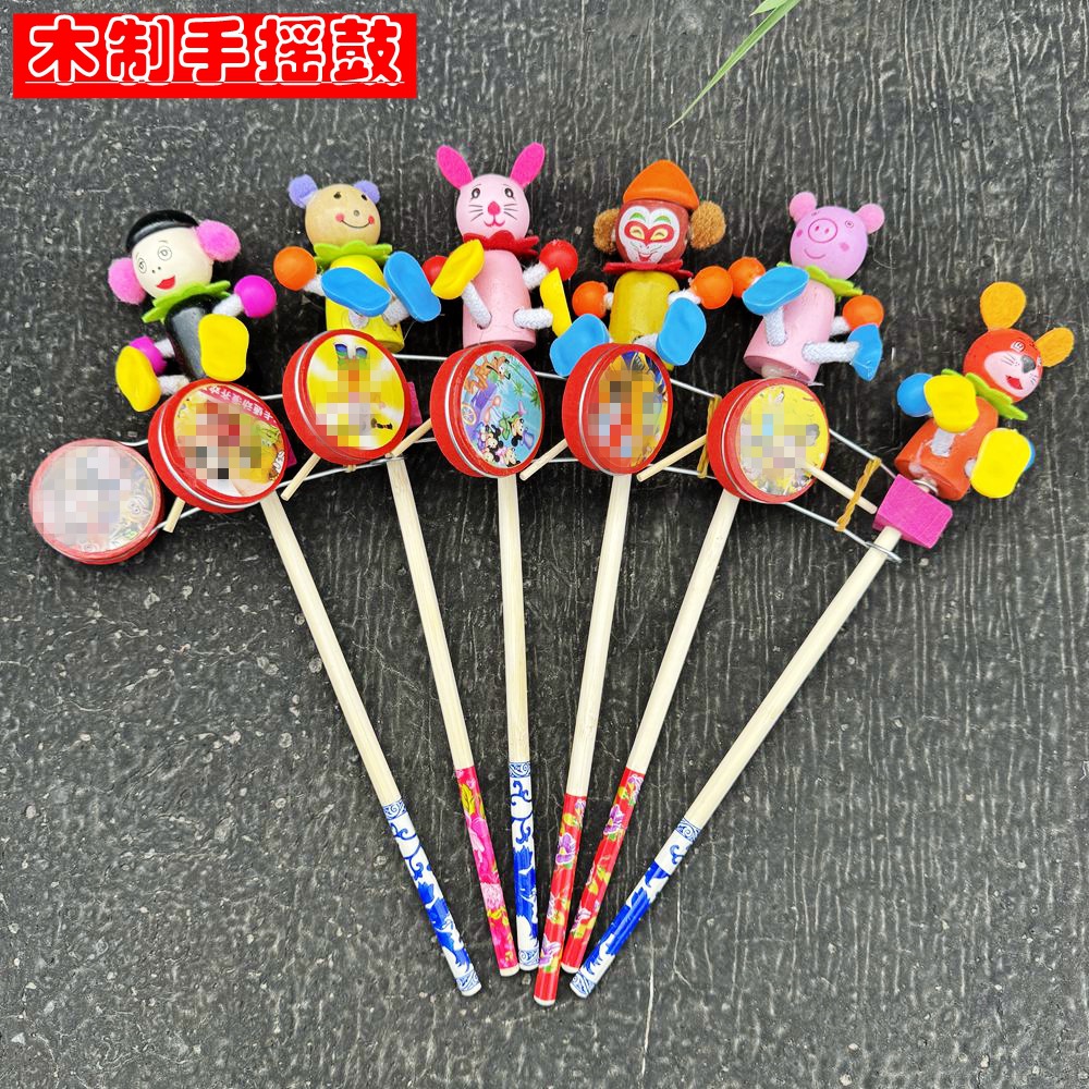 Деревянный ручной барабан Цветной мультяшный шейкер Игрушка для детей Погремушка Кукла Деревянный человек Уличный киоск Живописное место Хит продаж