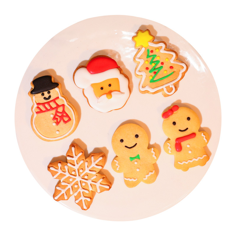 Christmas cookies cute icing decorating gingerbread man cookies Santa baking snacks Christmas gifts