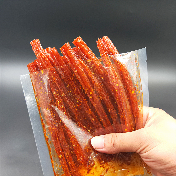 Picking up light spicy strips, big spicy slices, spicy skin, 125g gluten leisure stall batch of net red spicy strips, small snacks wholesale