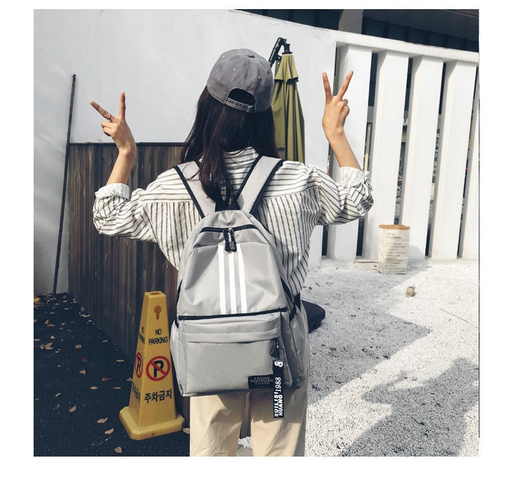 Schoolbag men's fashion fashion high school junior high school student large capacity primary school student campus backpack Korean casual backpack