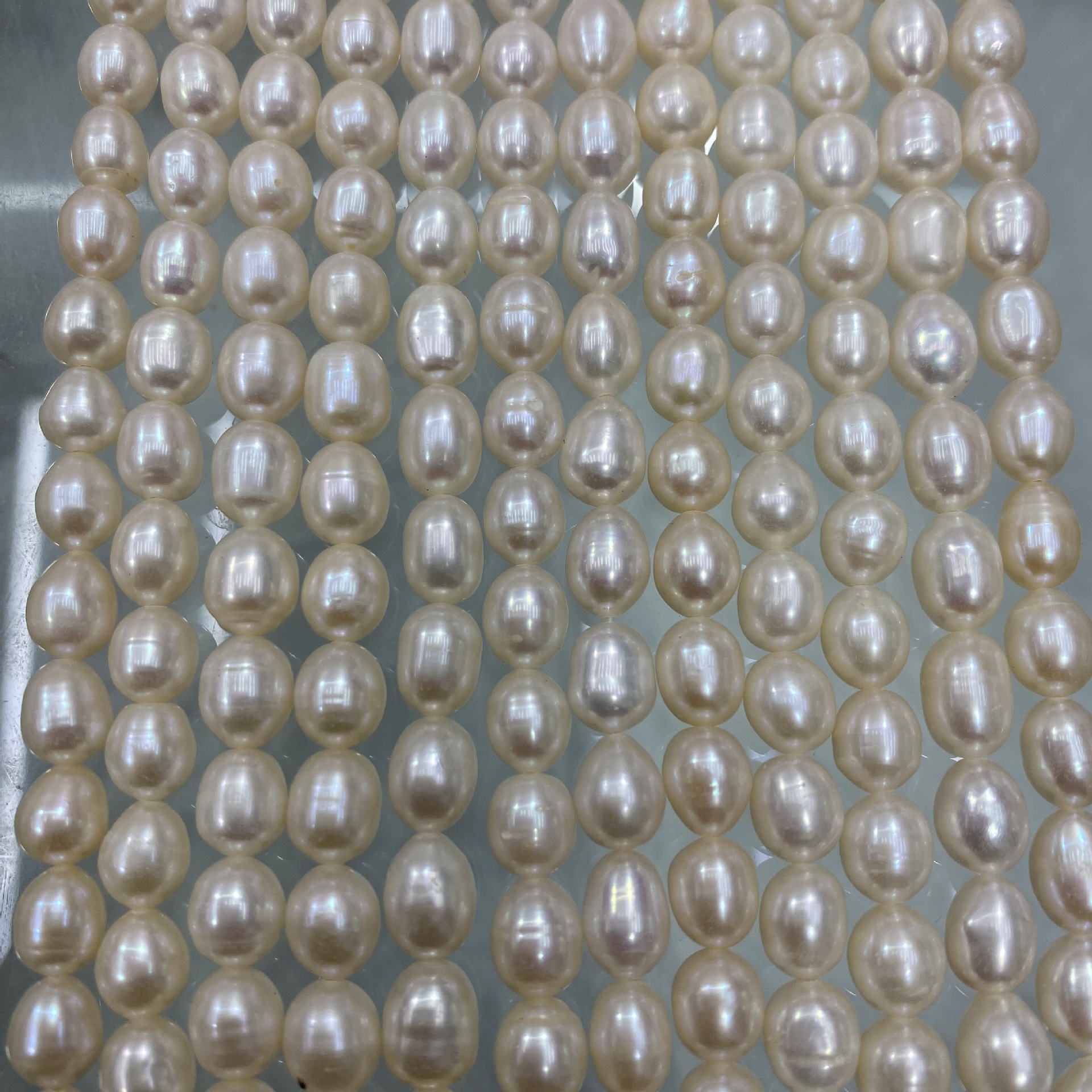 A variety of 5~6~7~8mm rice beads strong light light light pattern no flower skin natural freshwater pearl diy jewelry