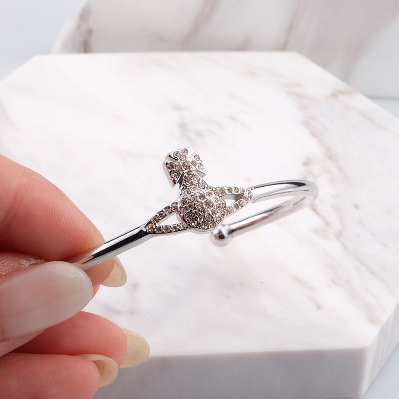 Браслет с логотипом Сатурн из серебра и шампанского, Эмпресс Сатурн серия