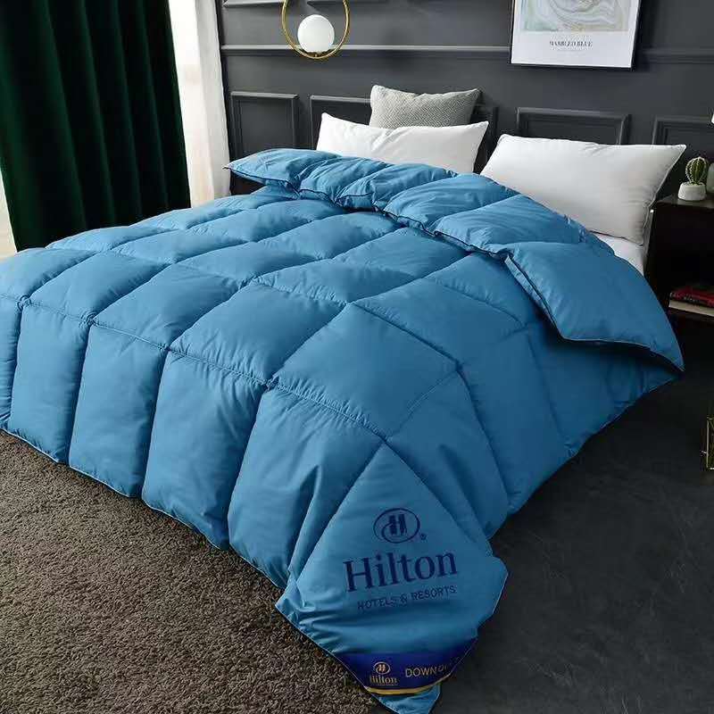 Hotel quilt Hilton feather velvet quilt in spring, autumn and winter is thickened quilt core wholesale company group purchase micro-business explosions