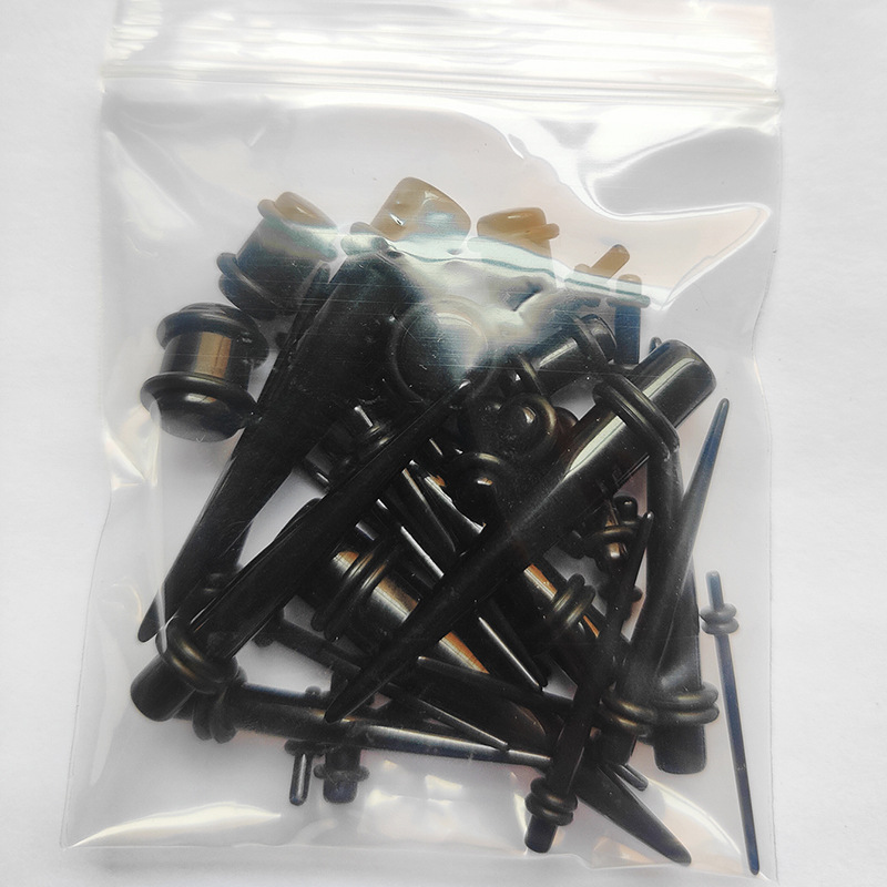 Wholesale 36Pcs Set Piercing Jewelry Pointed Cone Ear Expansion Ear Nail Uv Black Pointed Cone Ear Expander Manufacturer Supply