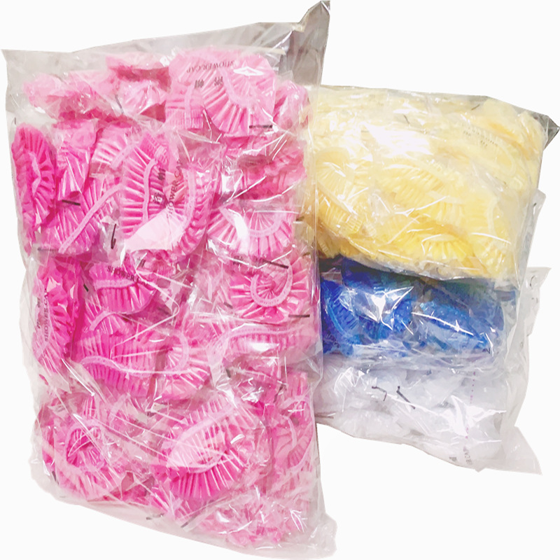 Disposable shower cap independent packaging pink blue yellow bar waterproof hotel beauty salon shower cap spot wholesale