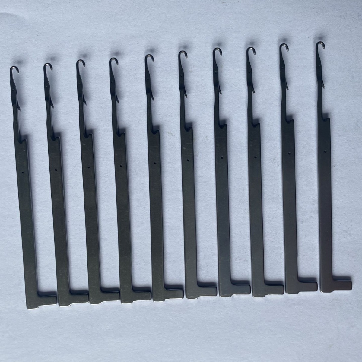 Manufacturer of Computerized Flat Knitting Machine Parts for Guangyang Single System 7 Needles Wholesale Guangyang Single System 7 Needles
