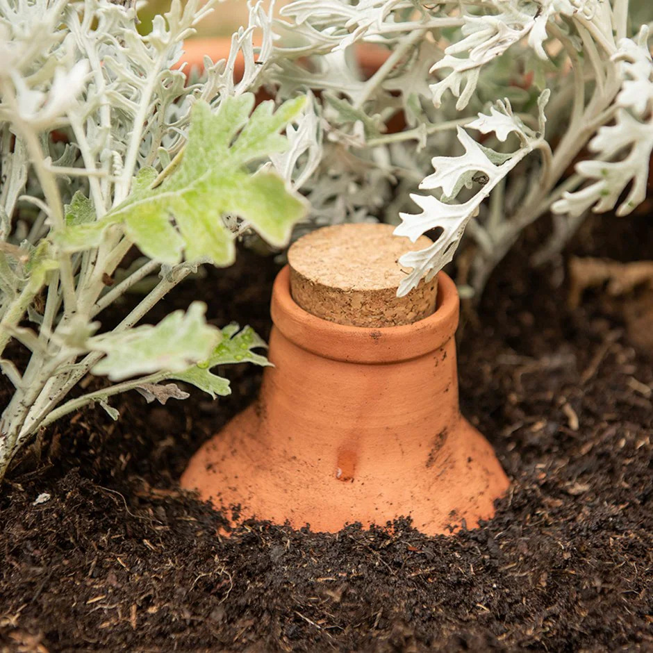 Cross-border automatic watering device red pottery water seepage device flower watering device water bottle with cork lid irrigation system dedicated