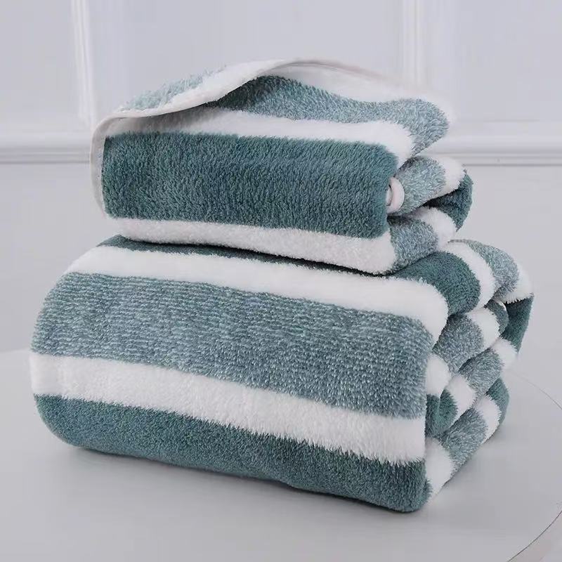 Wholesale warp knitted striped coral fleece bath towel 70*140 thick absorbent lint free gift wholesale household bath towel