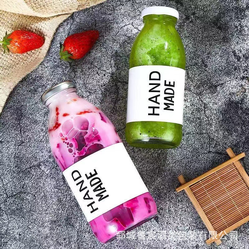 Manufacturer Wholesale Strawberry Milk Bottle Strawberry Milkshake Yogurt Poplar Nectar Glass Bottle with Lid Sealed Glass Empty Bottle
