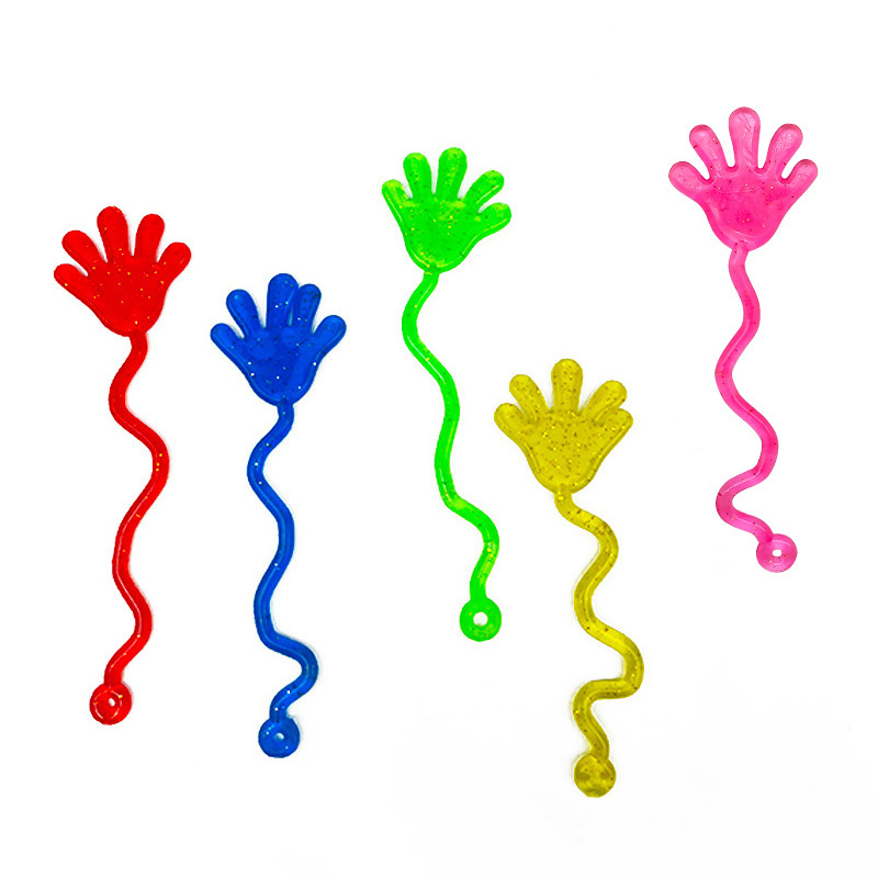 Popular Tpr Soft Rubber Elastic Stretchy Sticky Palm Glitter Gold Powder Wall Climbing Creative Prank Sticky Hands