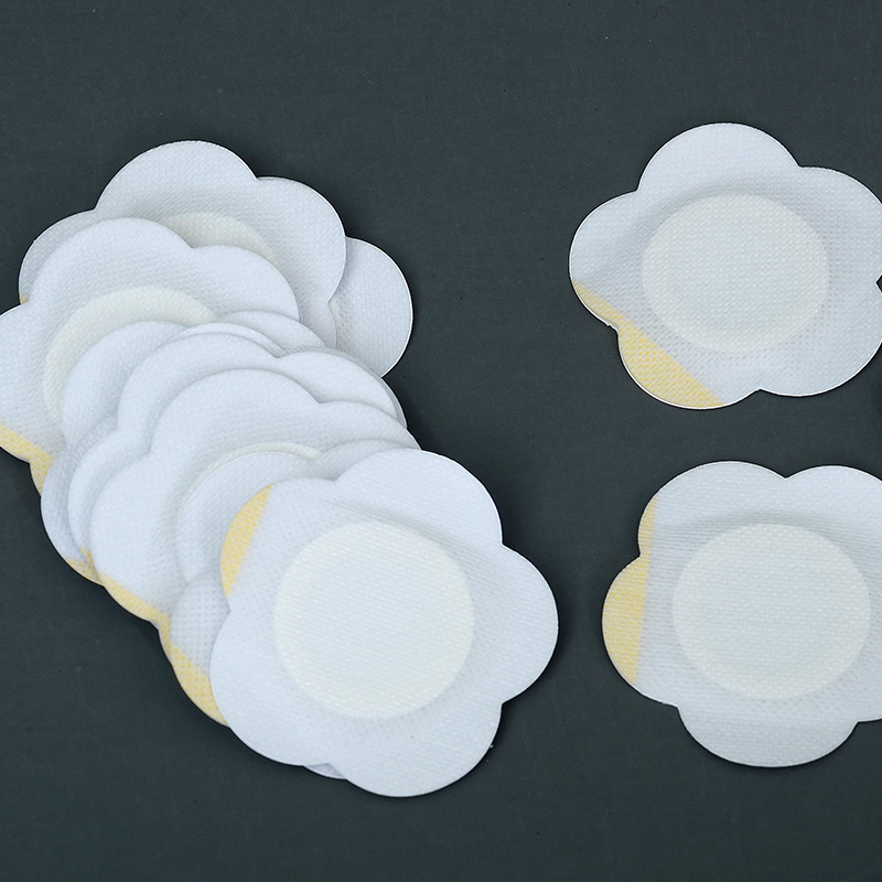 Plum blossom skin color non-woven three-volt patch moxibustion patch breathable dressing patch baby navel patch health care patch manufacturers wholesale