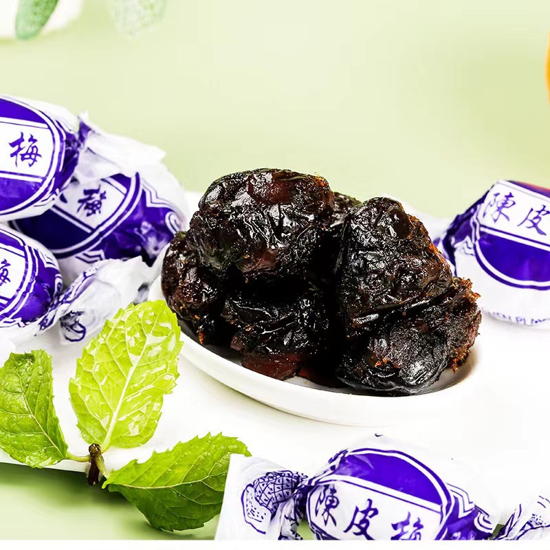 Paper-Wrapped Candied Plums with Tangerine Peel, Dried Sweet and Sour Plums, Childhood Snacks for Digestion