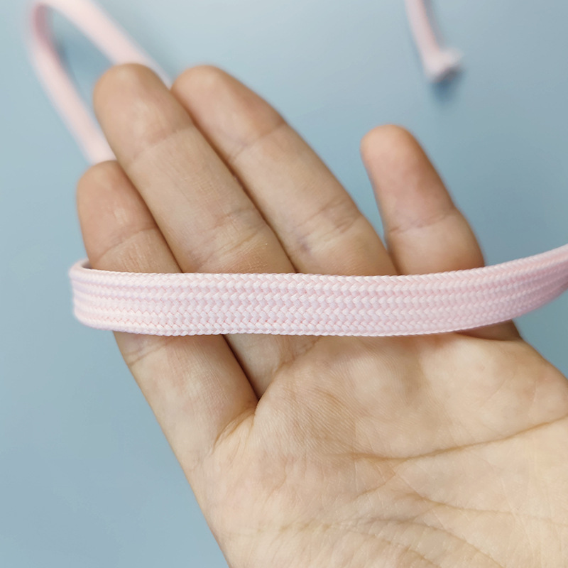 Factory sales 40 ingots low elastic silk double-layer hollow shoelace polyester thickened 1CM black and white flat shoelace waist rope hat rope