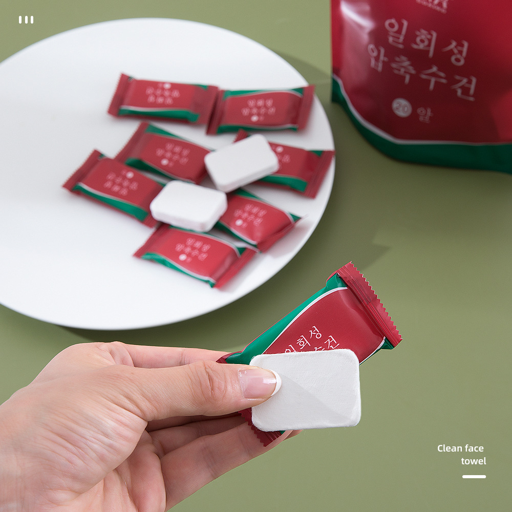 Disposable face wash towel compressed cleansing towel thickened portable disposable candy towel individually packaged granules wholesale