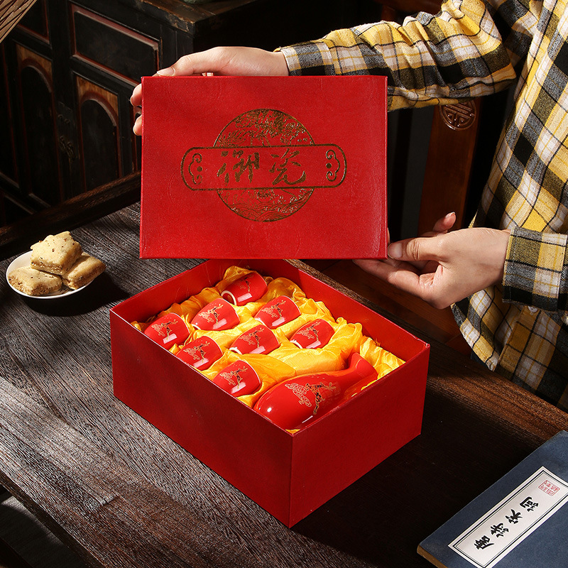 A pot of eight cups gift box penguin burning wine pot wine cup red golden dragon wine suit 9 ceramic wine dispenser