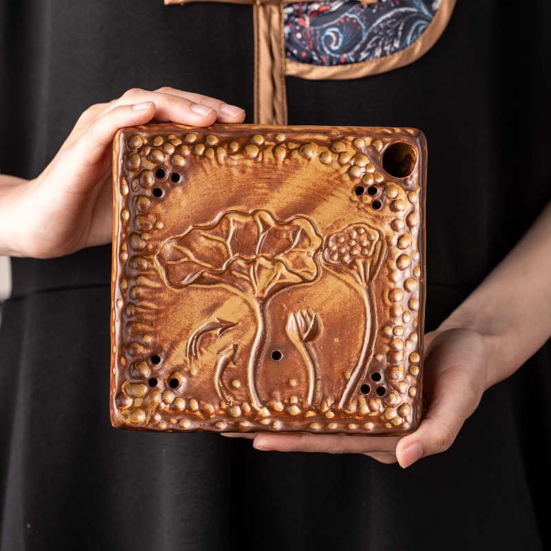 Large Japanese-Style Purple Clay Teapot with a Square Base for Brewing Tea, Featuring a Rustic Pottery Design