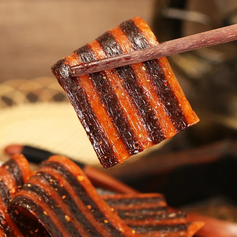 Zebra meat spicy strips wholesale in large quantities of childhood nostalgic spicy slices gluten spicy beans dried net red casual small packaging snacks