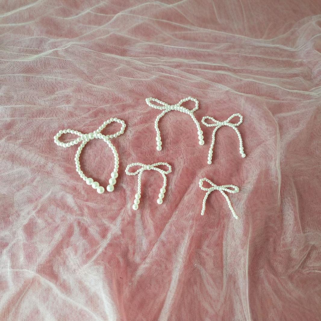 Japanese and Korean jewelry clothing imitation pearl bow accessories shoes and hats hair accessories wedding dress clothing bags decorative accessories wholesale