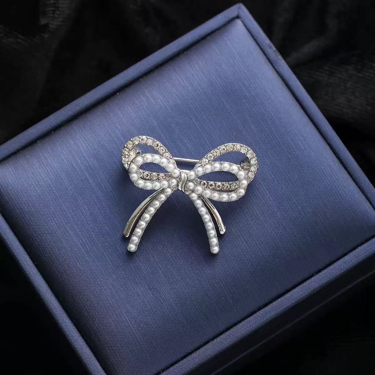 Bow Pearl Chanel Style Brooch High-end Women's Design Sense Anti-glare Corsage Fixed Clothes Pin Accessories Trendy