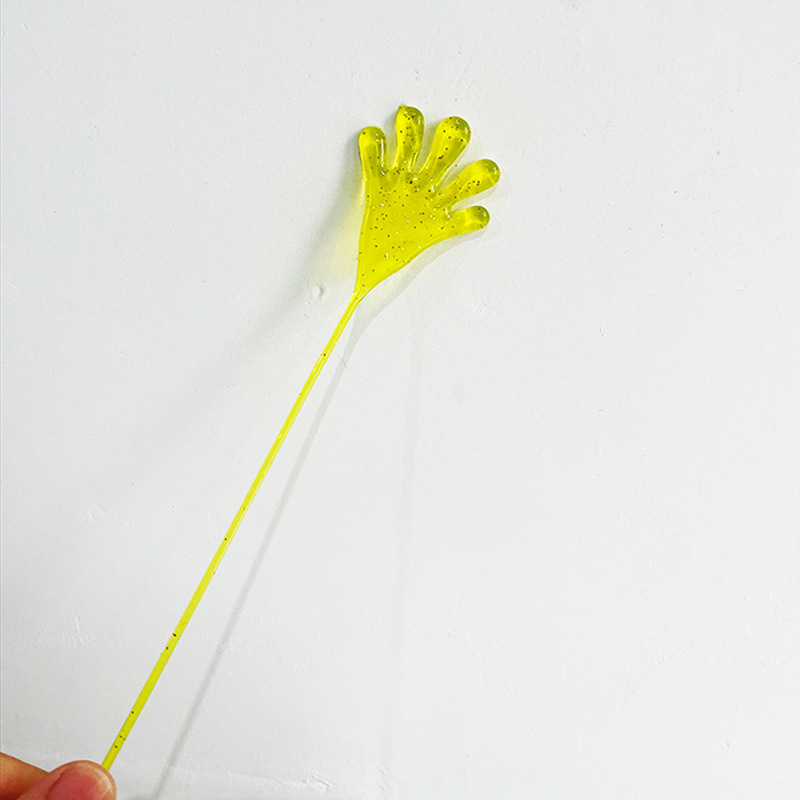 Popular Tpr Soft Rubber Elastic Stretchy Sticky Palm Glitter Gold Powder Wall Climbing Creative Prank Sticky Hands